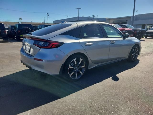 used 2025 Honda Civic Hybrid car, priced at $28,294