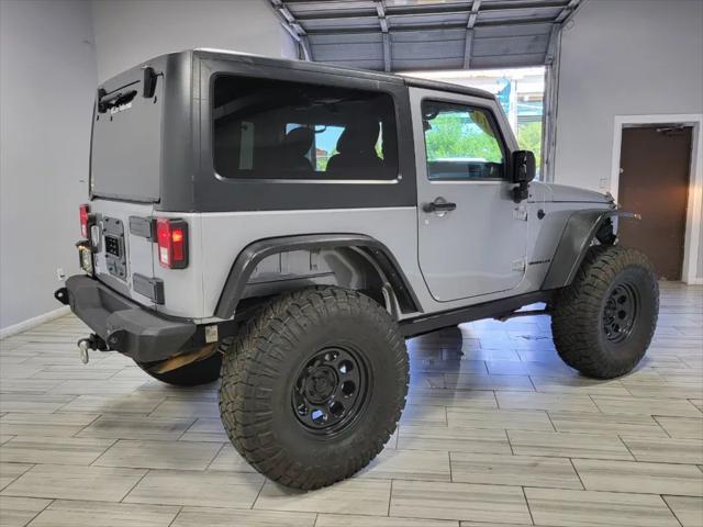 used 2014 Jeep Wrangler car, priced at $23,995