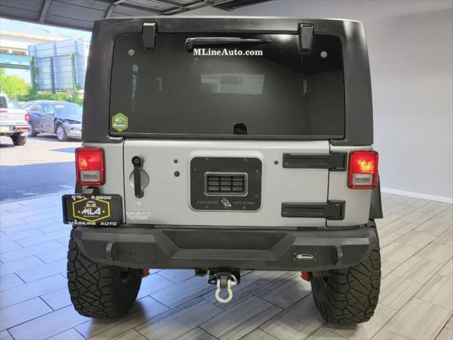 used 2014 Jeep Wrangler car, priced at $23,995