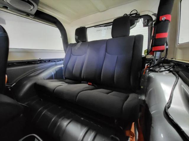 used 2014 Jeep Wrangler car, priced at $23,995