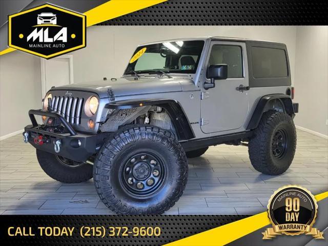 used 2014 Jeep Wrangler car, priced at $23,995