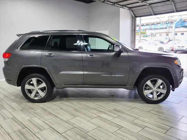 used 2014 Jeep Grand Cherokee car, priced at $22,995