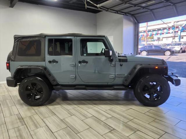 used 2014 Jeep Wrangler Unlimited car, priced at $18,995