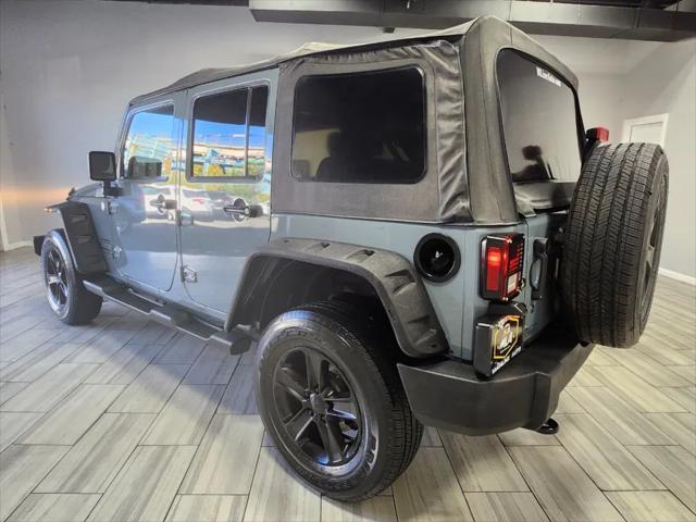 used 2014 Jeep Wrangler Unlimited car, priced at $18,995