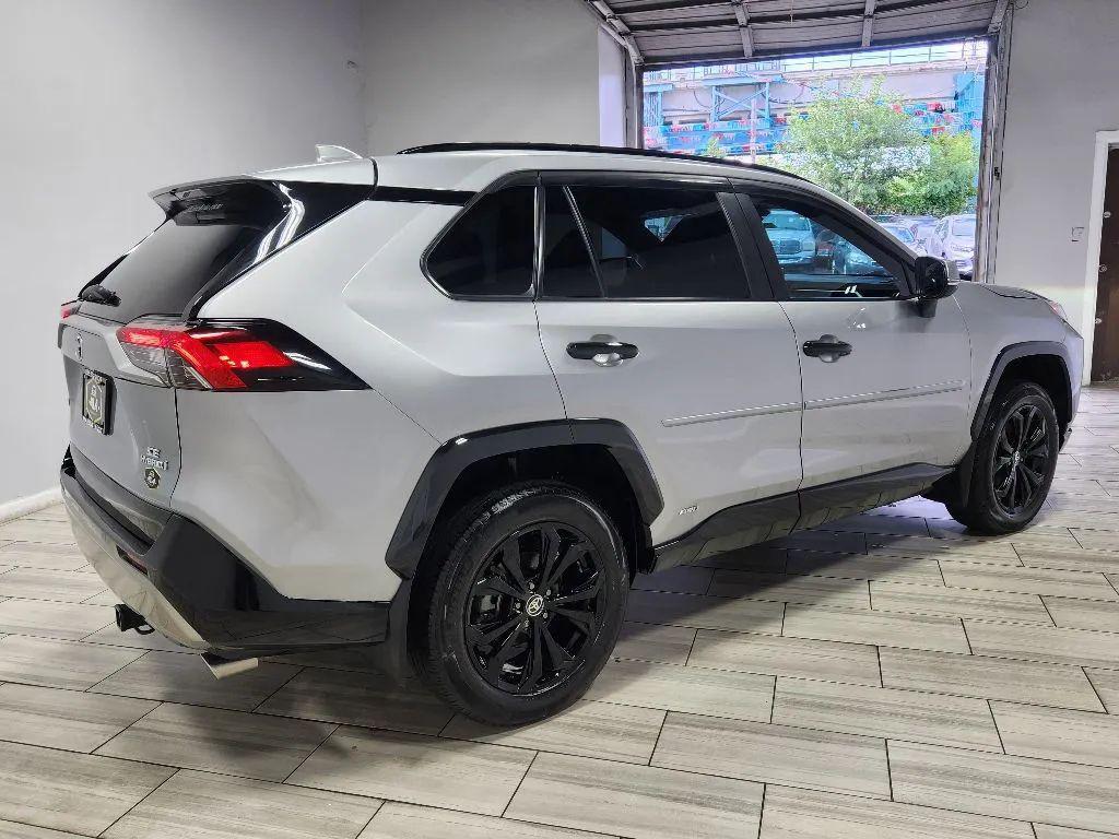 used 2023 Toyota RAV4 Hybrid car, priced at $29,999