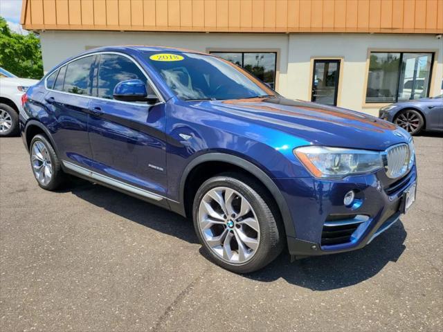 used 2018 BMW X4 car, priced at $17,995