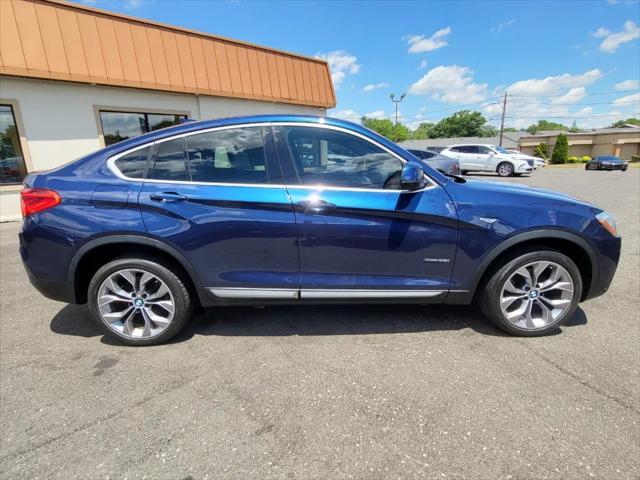 used 2018 BMW X4 car, priced at $17,995