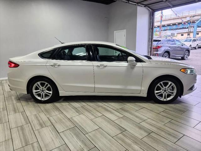 used 2018 Ford Fusion car, priced at $13,999