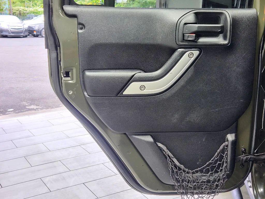 used 2015 Jeep Wrangler Unlimited car, priced at $21,599