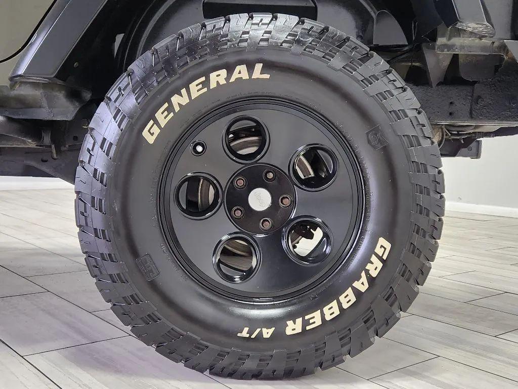 used 2015 Jeep Wrangler Unlimited car, priced at $21,599