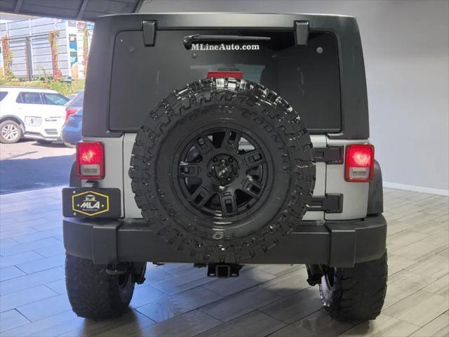 used 2016 Jeep Wrangler Unlimited car, priced at $18,995