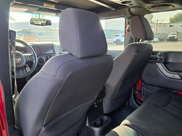 used 2013 Jeep Wrangler Unlimited car, priced at $19,600