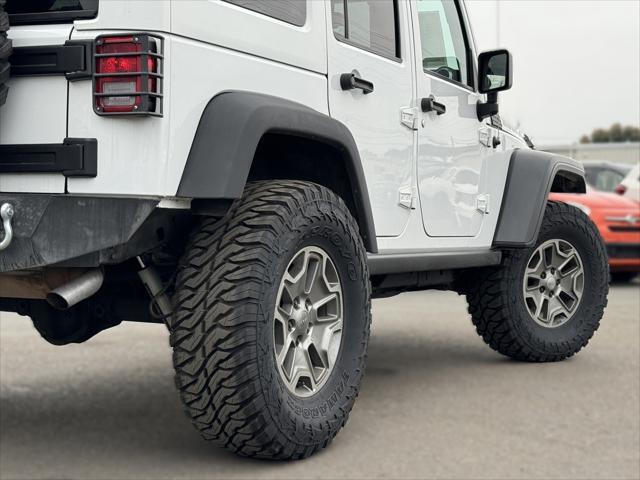 used 2016 Jeep Wrangler Unlimited car, priced at $34,649