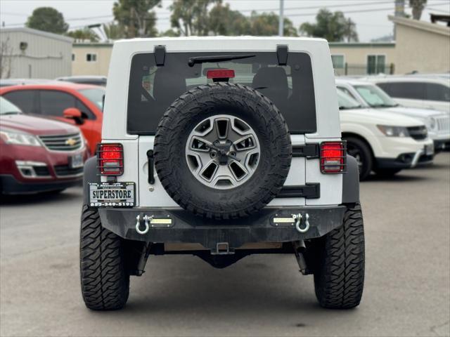 used 2016 Jeep Wrangler Unlimited car, priced at $34,649