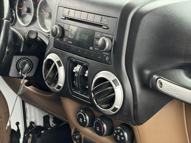 used 2016 Jeep Wrangler Unlimited car, priced at $34,649