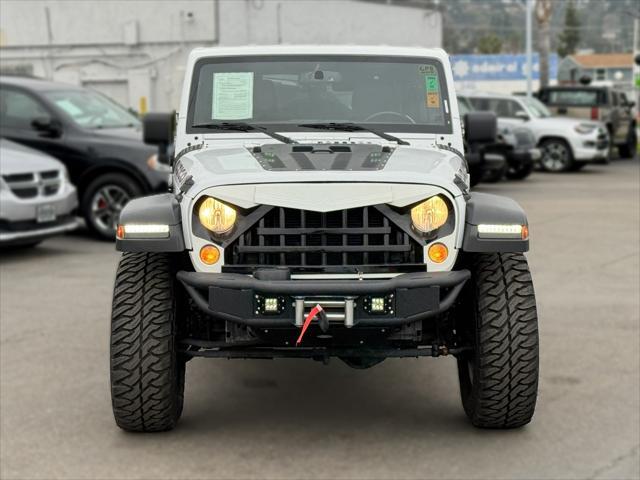 used 2016 Jeep Wrangler Unlimited car, priced at $34,649