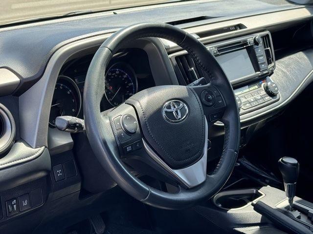 used 2018 Toyota RAV4 car, priced at $19,999