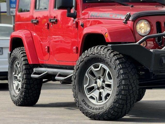 used 2014 Jeep Wrangler Unlimited car, priced at $34,888