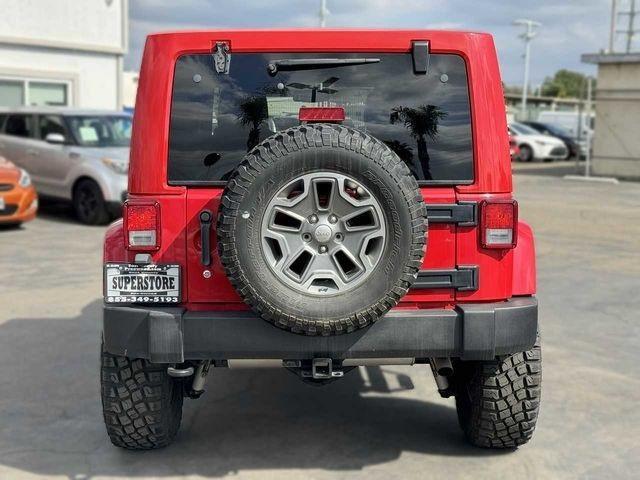 used 2014 Jeep Wrangler Unlimited car, priced at $34,888