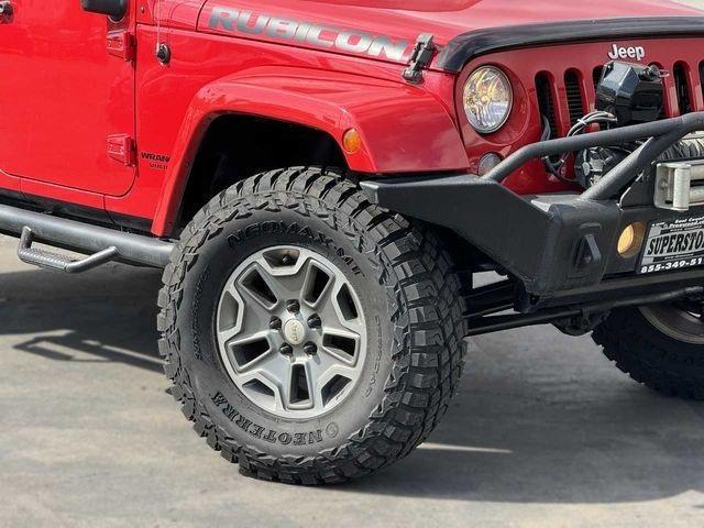 used 2014 Jeep Wrangler Unlimited car, priced at $34,888