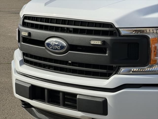 used 2018 Ford F-150 car, priced at $23,460