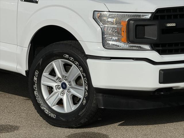 used 2018 Ford F-150 car, priced at $23,460