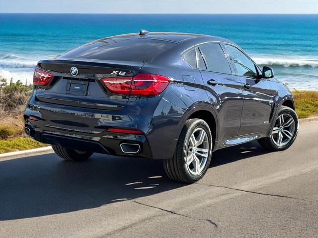 used 2019 BMW X6 car, priced at $33,995