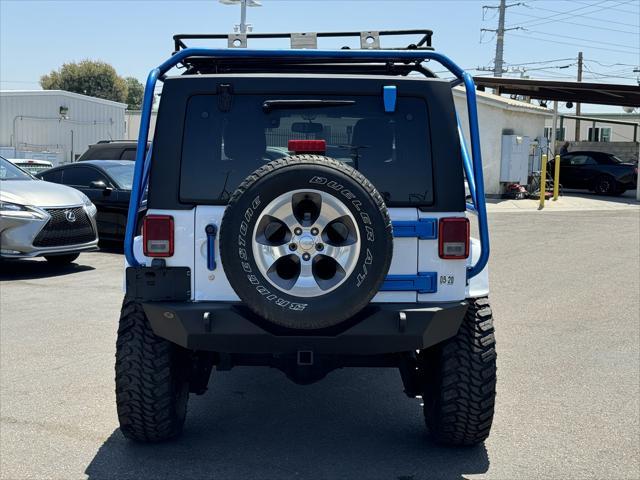 used 2018 Jeep Wrangler JK Unlimited car, priced at $28,994