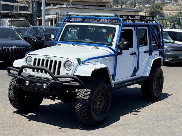 used 2018 Jeep Wrangler JK Unlimited car, priced at $28,994