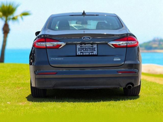 used 2019 Ford Fusion car, priced at $13,999