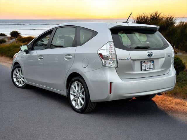 used 2014 Toyota Prius v car, priced at $14,999