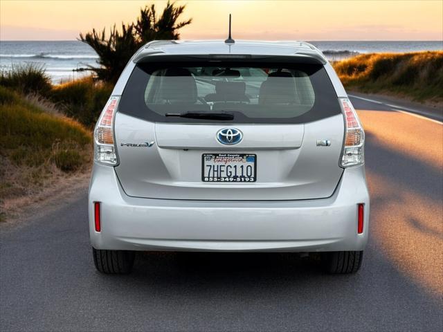 used 2014 Toyota Prius v car, priced at $14,999