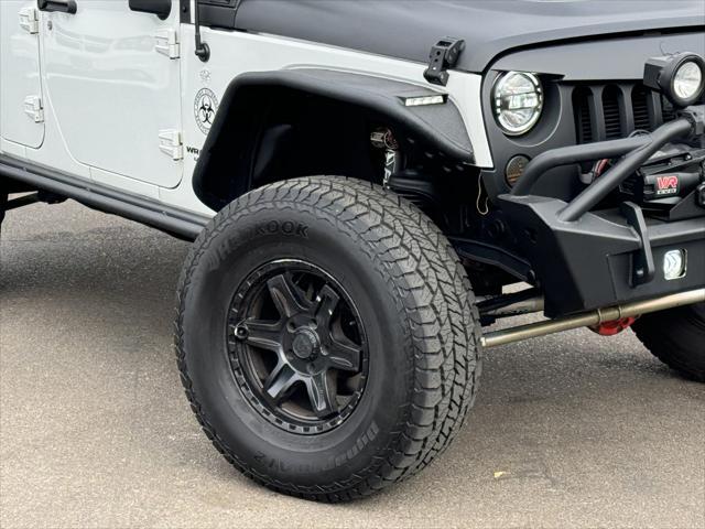 used 2014 Jeep Wrangler Unlimited car, priced at $22,995