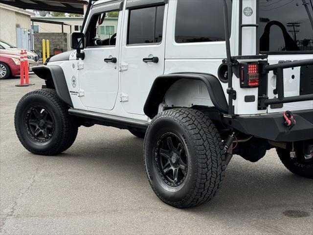 used 2014 Jeep Wrangler Unlimited car, priced at $22,995