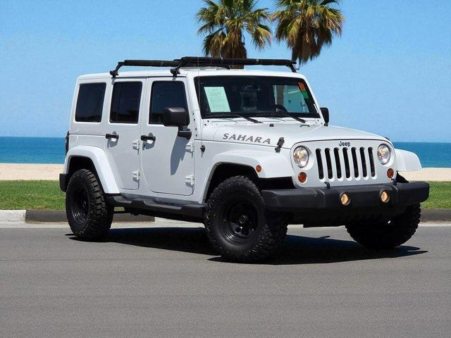 used 2015 Jeep Wrangler Unlimited car, priced at $17,999