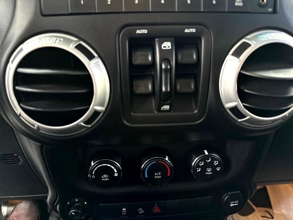 used 2015 Jeep Wrangler Unlimited car, priced at $19,900