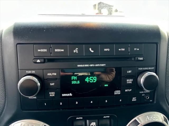 used 2015 Jeep Wrangler Unlimited car, priced at $19,900
