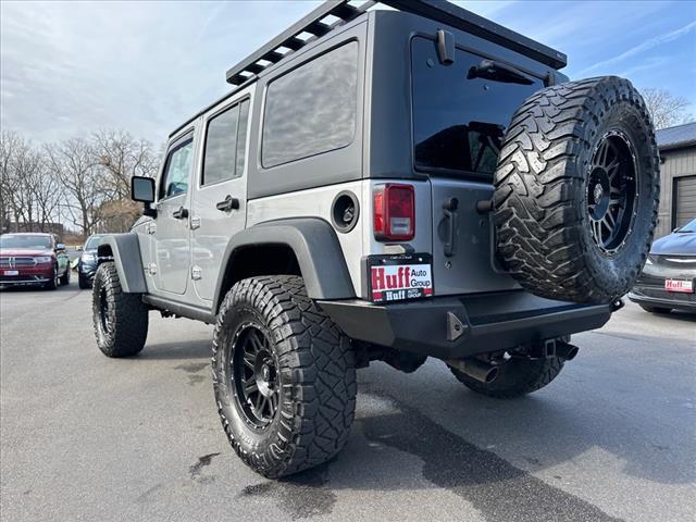 used 2013 Jeep Wrangler Unlimited car, priced at $13,900