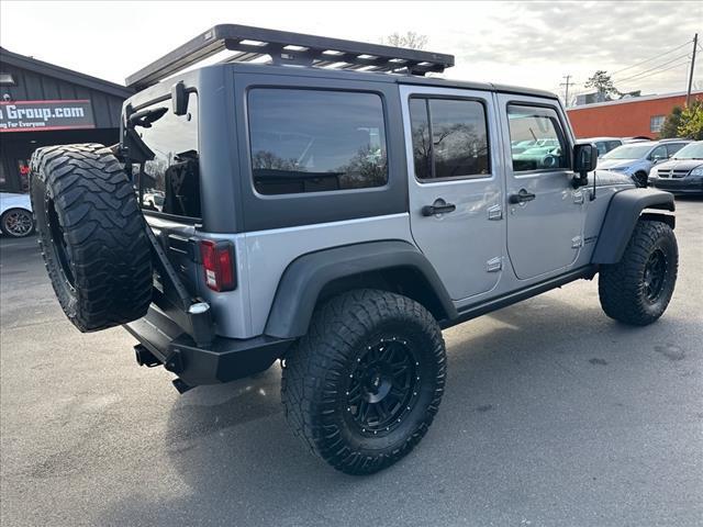 used 2013 Jeep Wrangler Unlimited car, priced at $13,900