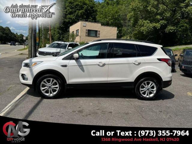 used 2018 Ford Escape car, priced at $9,695