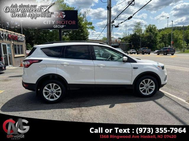 used 2018 Ford Escape car, priced at $9,695