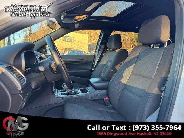used 2021 Jeep Grand Cherokee car, priced at $20,348