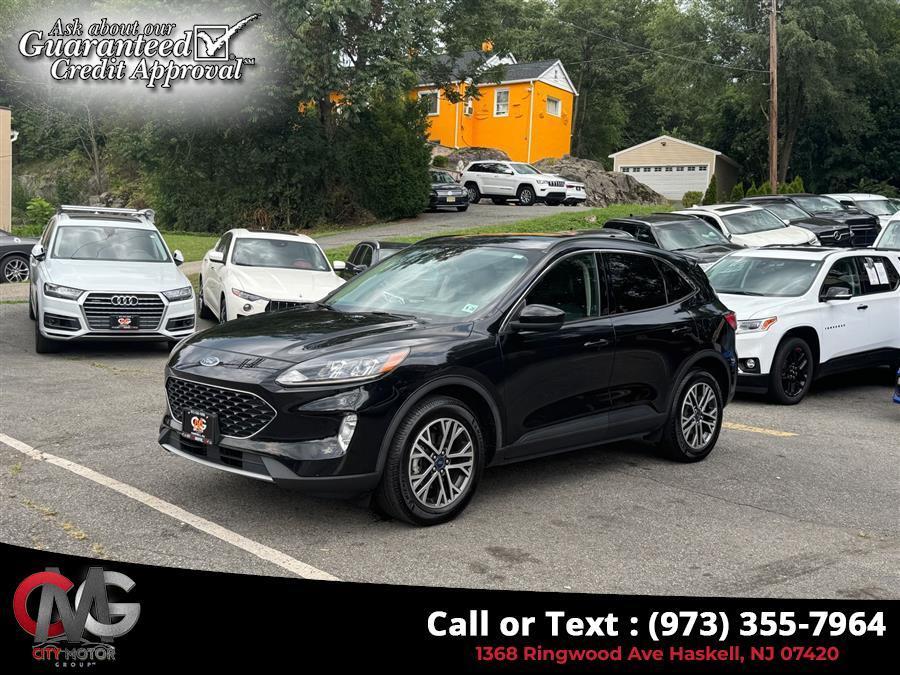 used 2020 Ford Escape car, priced at $16,252