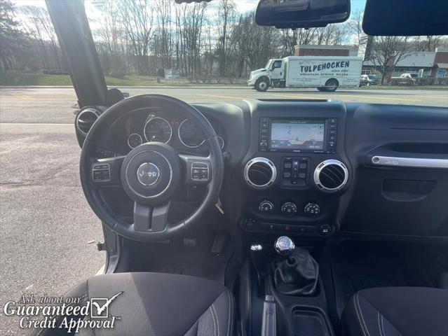 used 2014 Jeep Wrangler Unlimited car, priced at $16,495