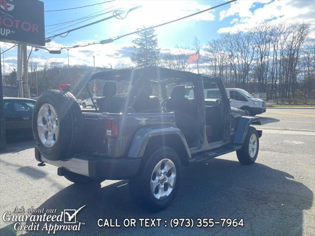 used 2014 Jeep Wrangler Unlimited car, priced at $16,995