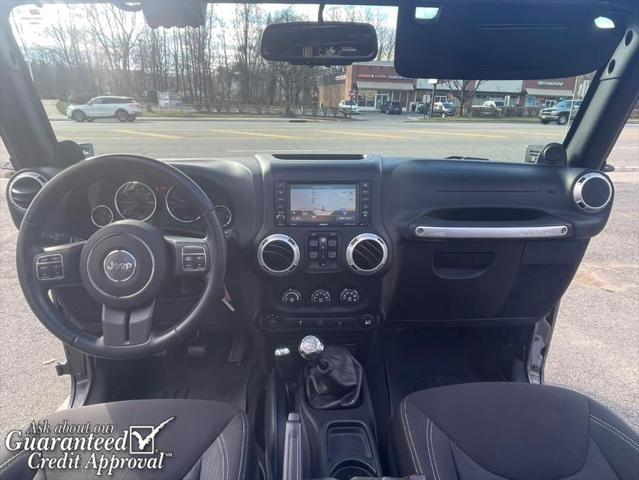 used 2014 Jeep Wrangler Unlimited car, priced at $16,495