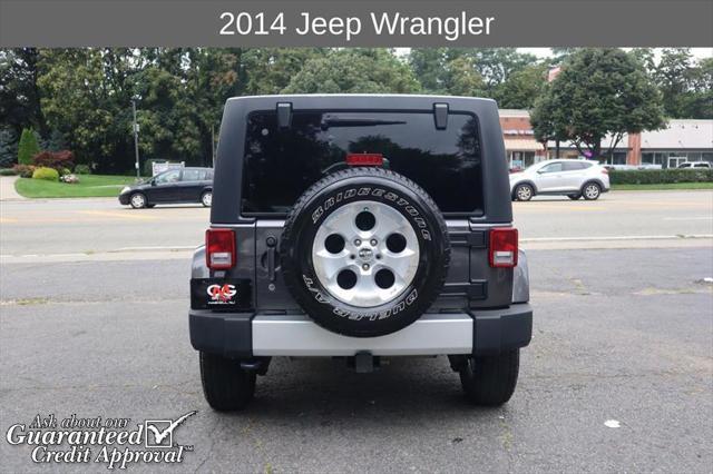 used 2014 Jeep Wrangler Unlimited car, priced at $16,495