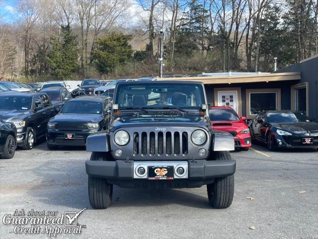 used 2014 Jeep Wrangler Unlimited car, priced at $16,495