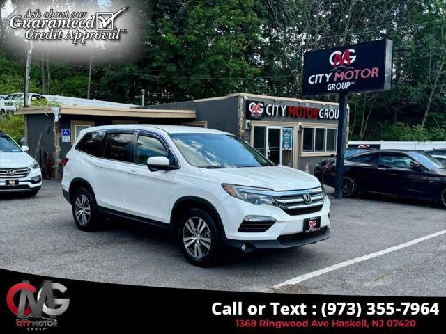 used 2018 Honda Pilot car, priced at $16,613