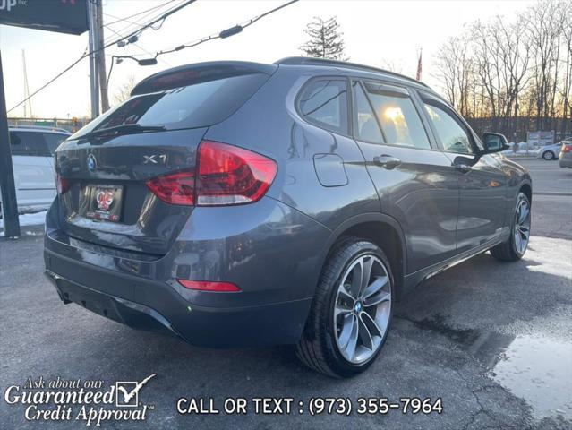 used 2015 BMW X1 car, priced at $12,995